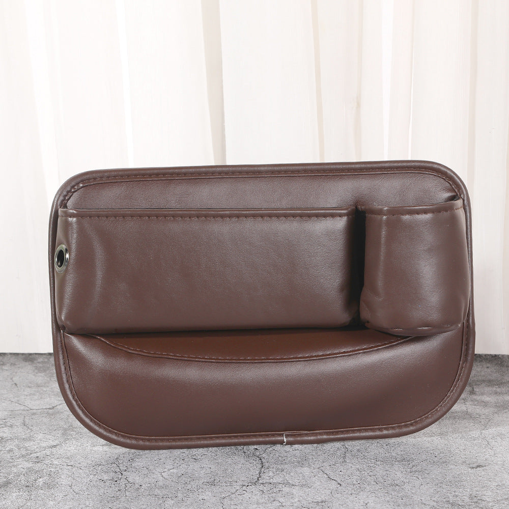 Brown car seat gap filler close up