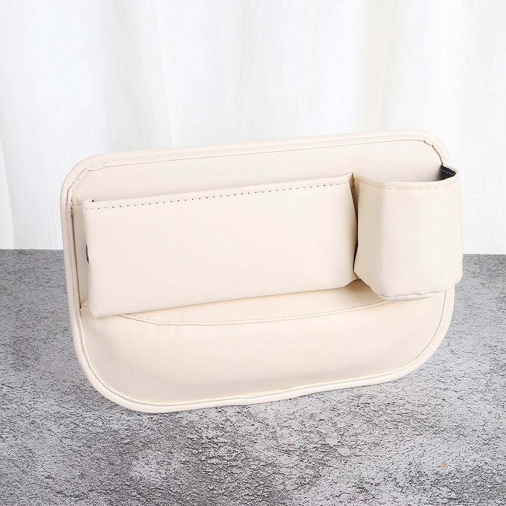 Beige car seat gap filler and organizer
